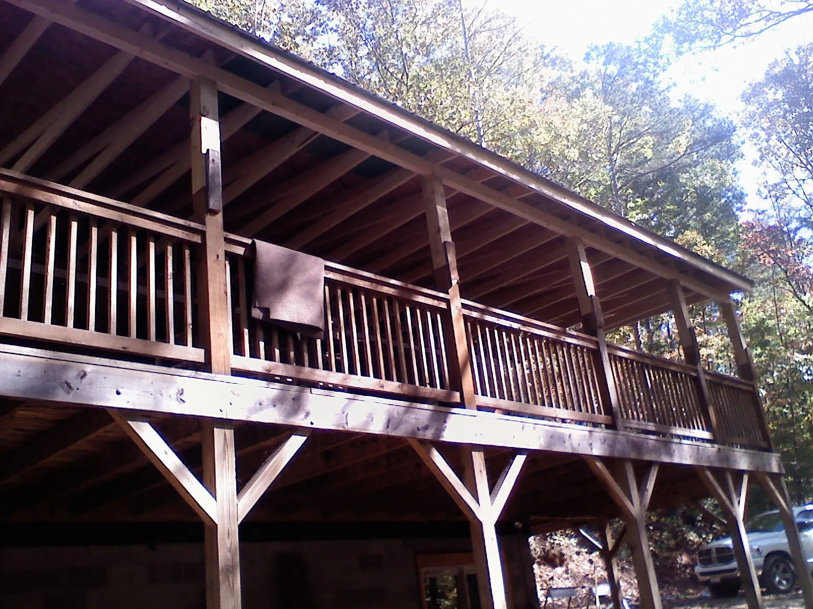Timber framing under a new elevated porch and deck — Roof Leak Repair in Great Falls by Roofing Brothers